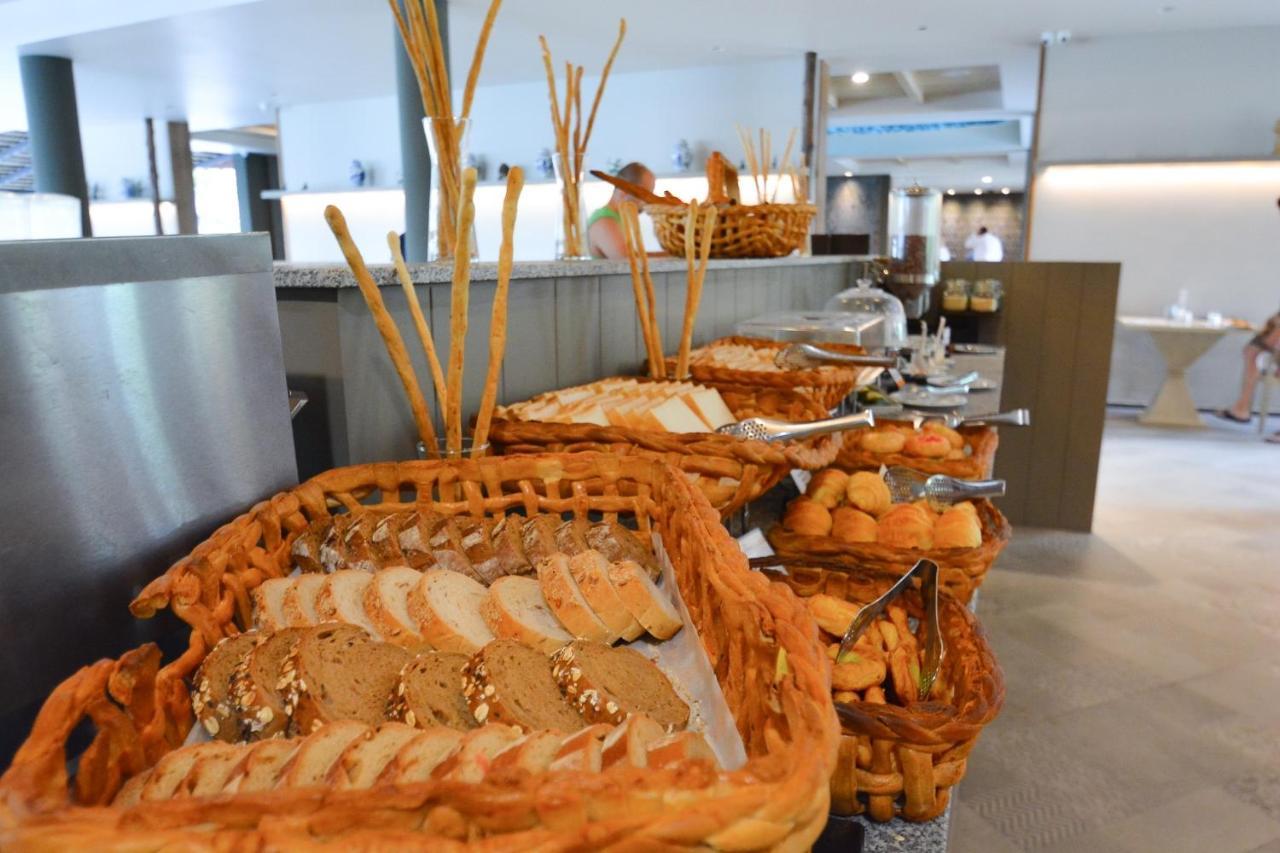 Andaman Cannacia Resort&Spa - SHA Extra Plus Kata Exterior foto A bread station at a buffet